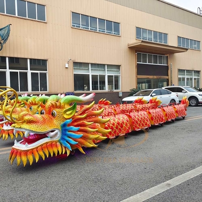 Un buon prezzo. Treno elettrico personalizzato a forma di drago cinese per parchi a tema 350W 100kg di carico in linea